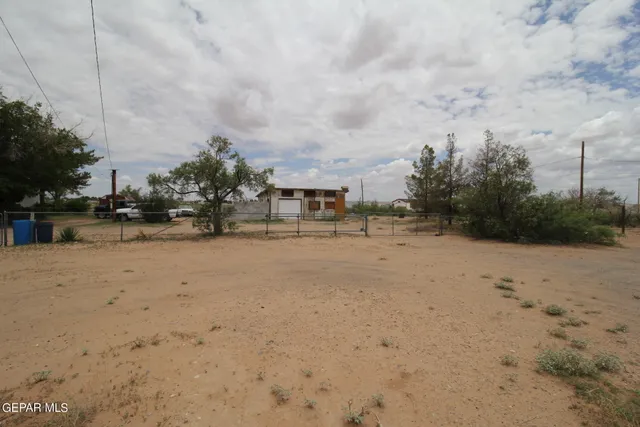 a view of a road with a building in the background