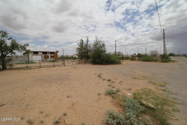 a view of a city street with a building