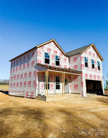 a view of a house with a swimming pool