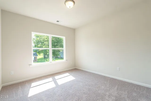 an empty room with a window