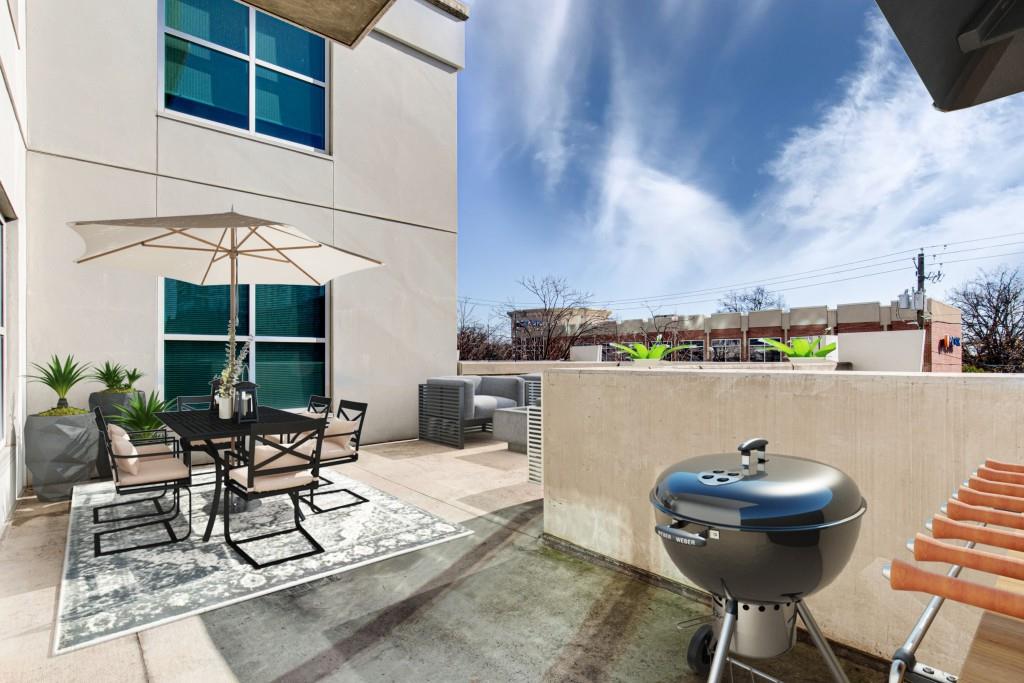 250 Pharr Road Northeast, Unit 216 Atlanta, GA 30305 - Photo 17 of 38 a view of a chairs and table in patio
