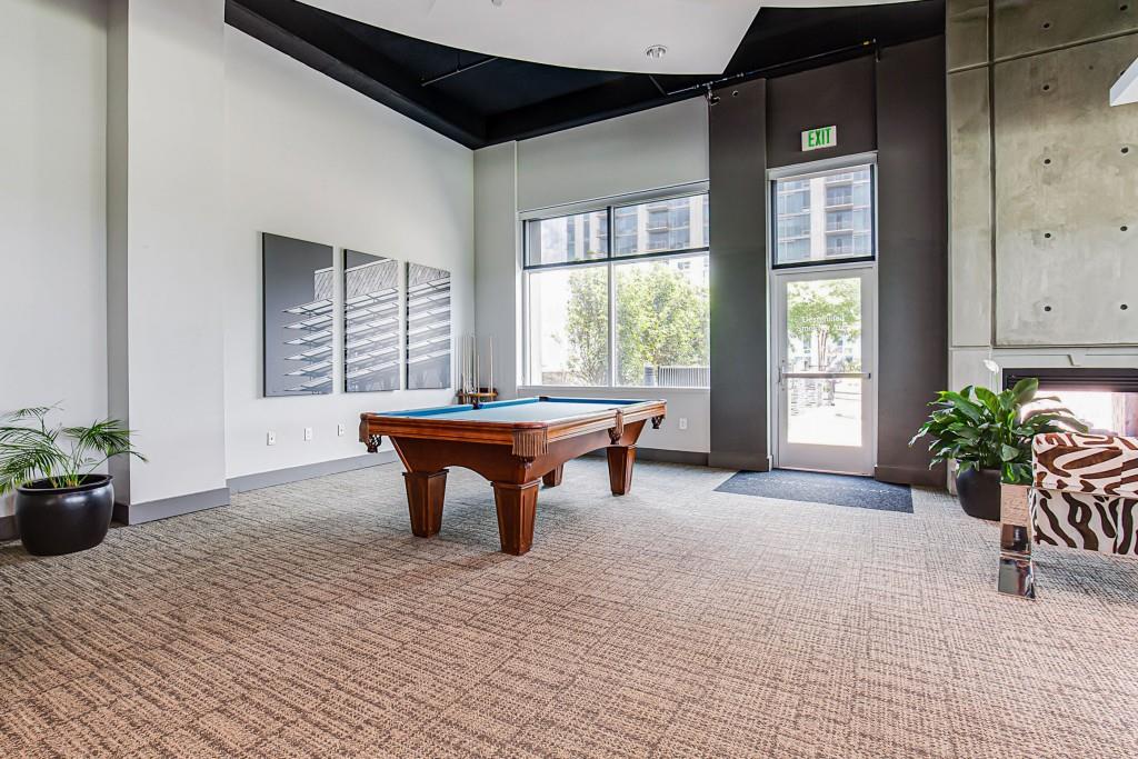 250 Pharr Road Northeast, Unit 216 Atlanta, GA 30305 - Photo 32 of 38 a room with furniture and window