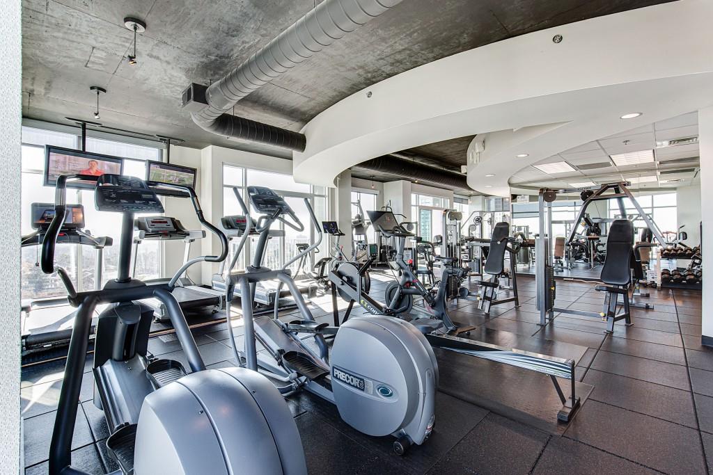 250 Pharr Road Northeast, Unit 216 Atlanta, GA 30305 - Photo 35 of 38 a view of a room with gym equipment