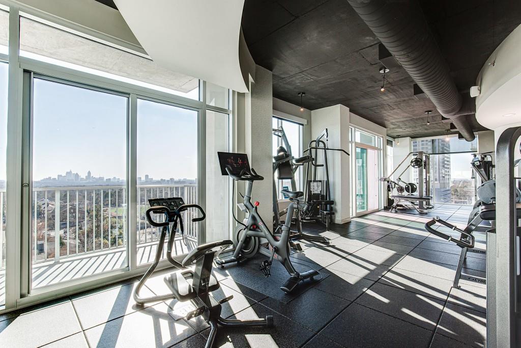 250 Pharr Road Northeast, Unit 216 Atlanta, GA 30305 - Photo 36 of 38 a view of a room with gym equipment