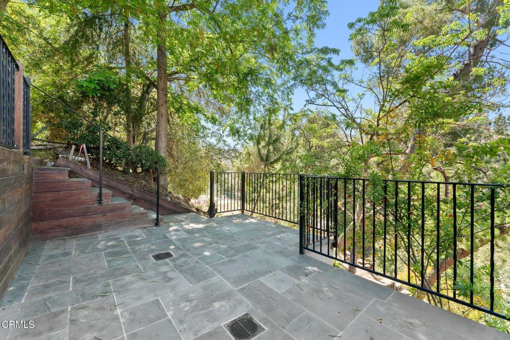 405 Woodcliffe Road Pasadena, CA 91105 - Photo 60 of 65 a view of a yard with plants and trees