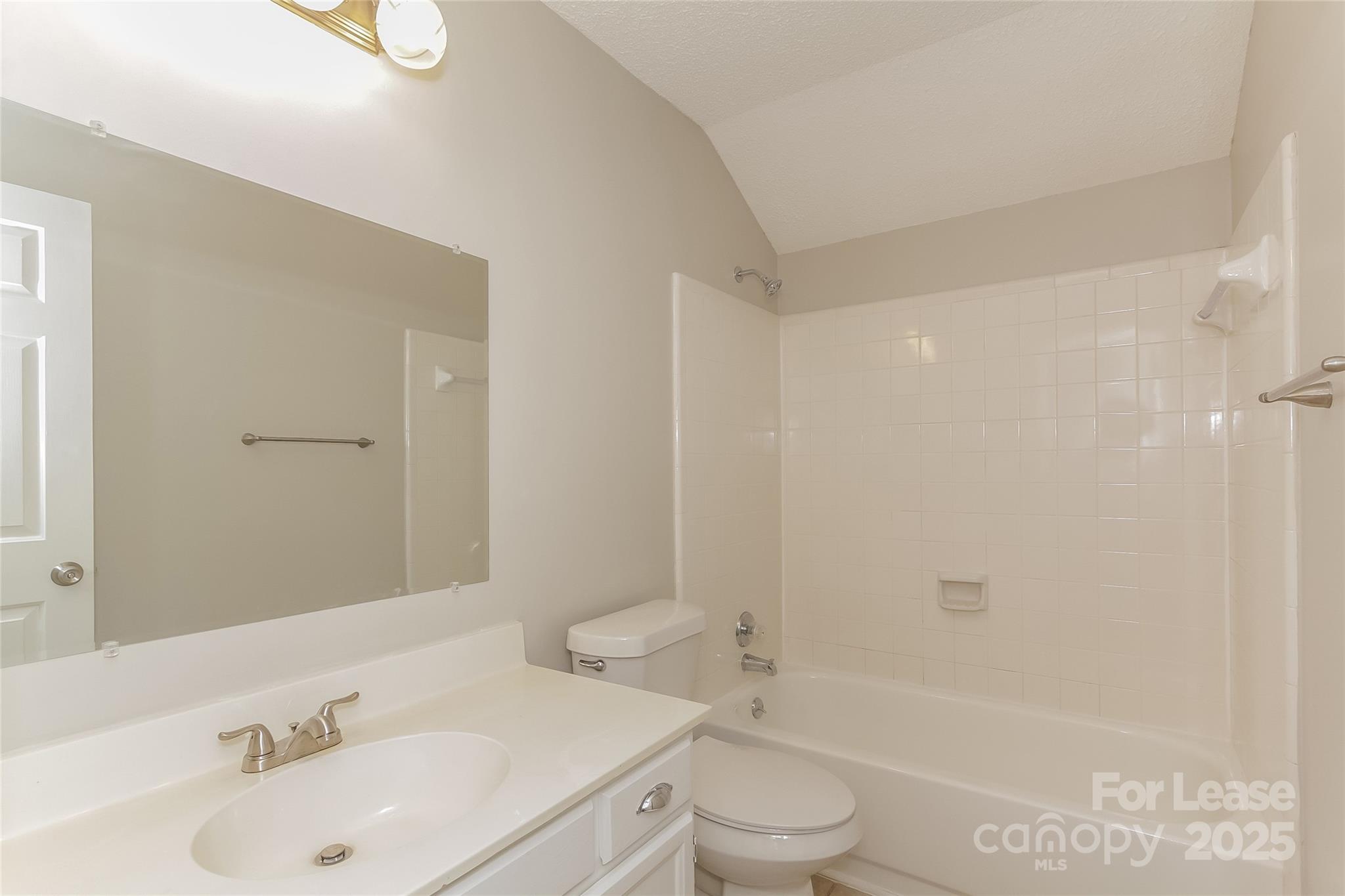 926 Eldorado Avenue Charlotte, NC 28262 - Photo 16 of 17 a bathroom with a sink toilet and shower