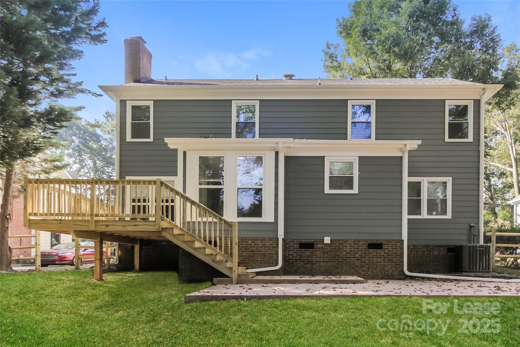 926 Eldorado Avenue Charlotte, NC 28262 - Photo 17 of 17 a view of house with a yard and deck