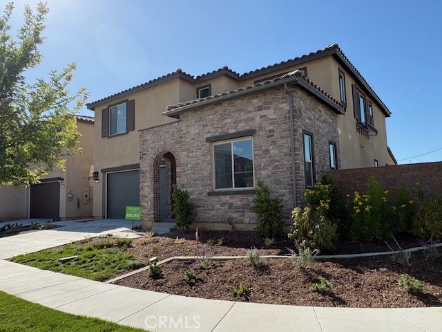 3706 Leafgreen Road Corona, CA 92883 - Photo 1 of 5 a front view of a house with garden