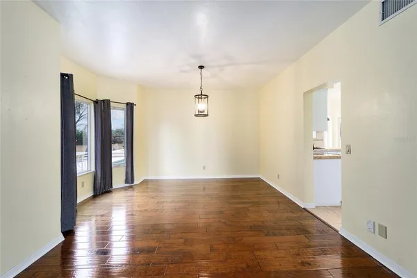 a kitchen with stainless steel appliances a refrigerator sink and cabinets