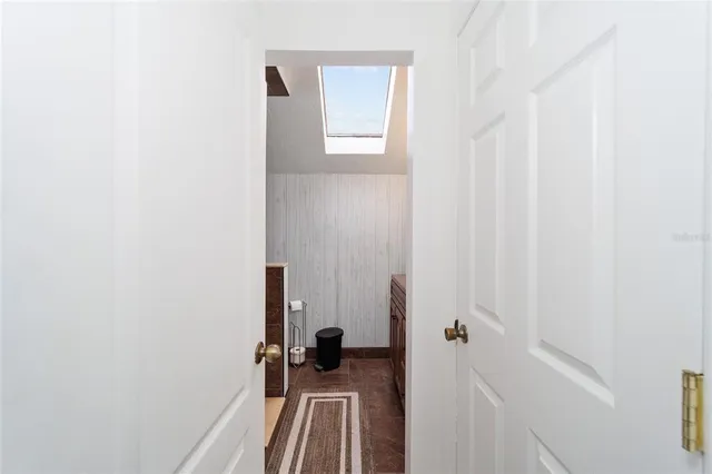 a view of an empty room with a large window