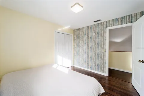 a view of a swimming pool with an outdoor seating