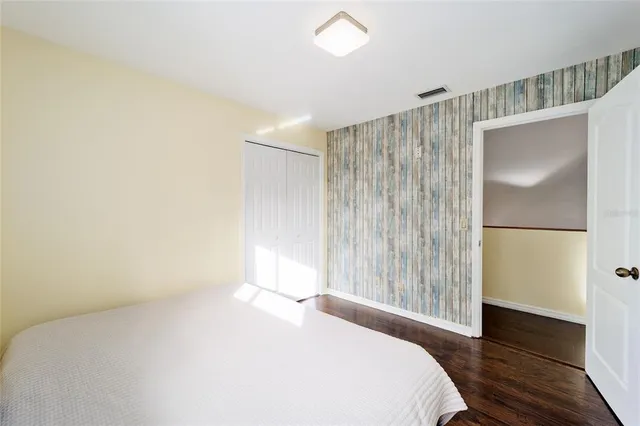 a view of a swimming pool with an outdoor seating