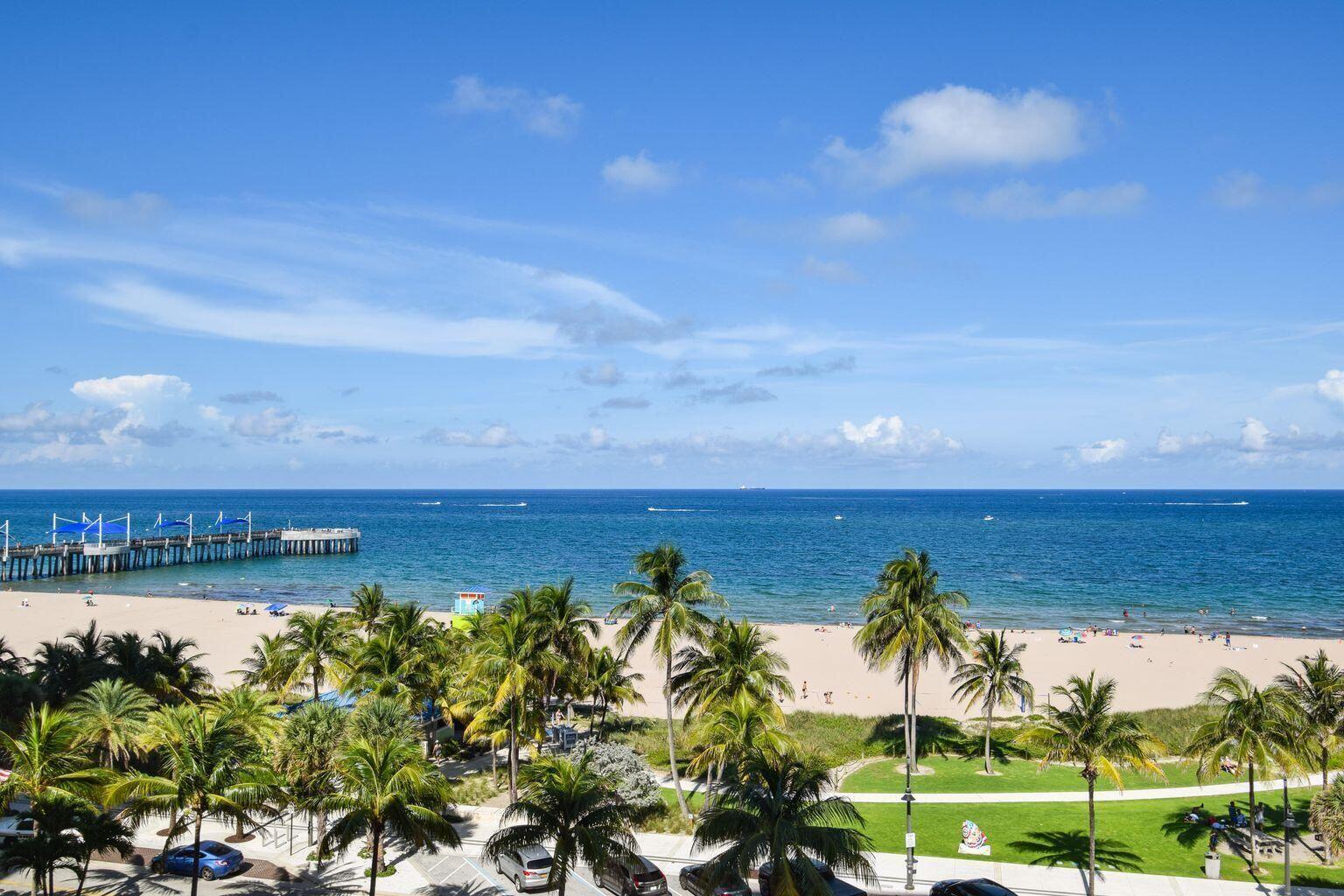 111 North Pompano Beach Boulevard, Unit 811 Pompano Beach, FL 33062 - Photo 4 of 24 a view of a lake with a city in the background