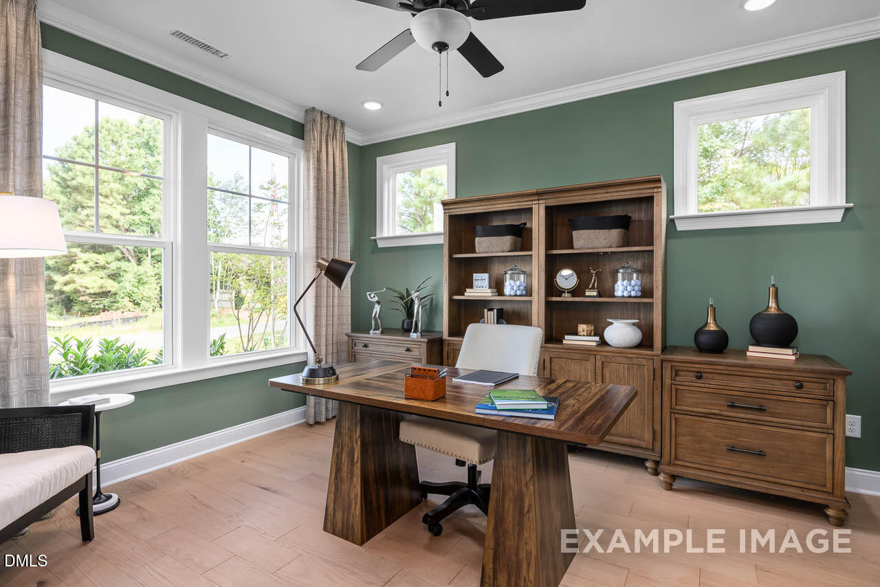 83 Crop Road Angier, NC 27501 - Photo 3 of 40 a workspace with a window