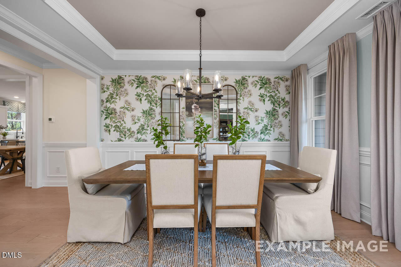 83 Crop Road Angier, NC 27501 - Photo 4 of 40 a view of a dining room with furniture window and outside view