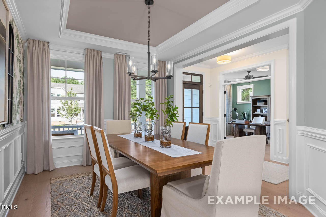 83 Crop Road Angier, NC 27501 - Photo 5 of 40 a view of a dining room with furniture window and outside view