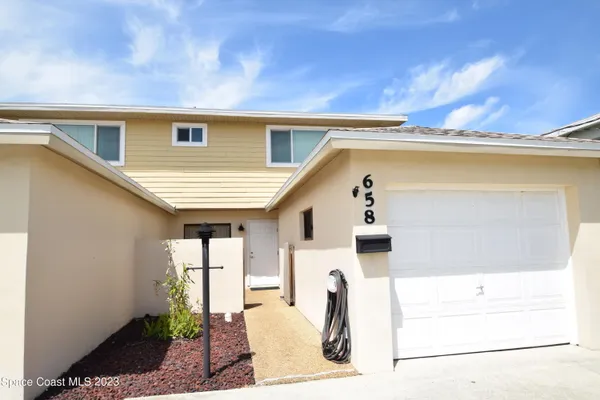 a view of a house with a porch