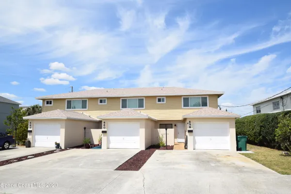a view of a house with a street