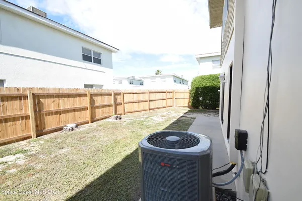 a front view of a house with a garage