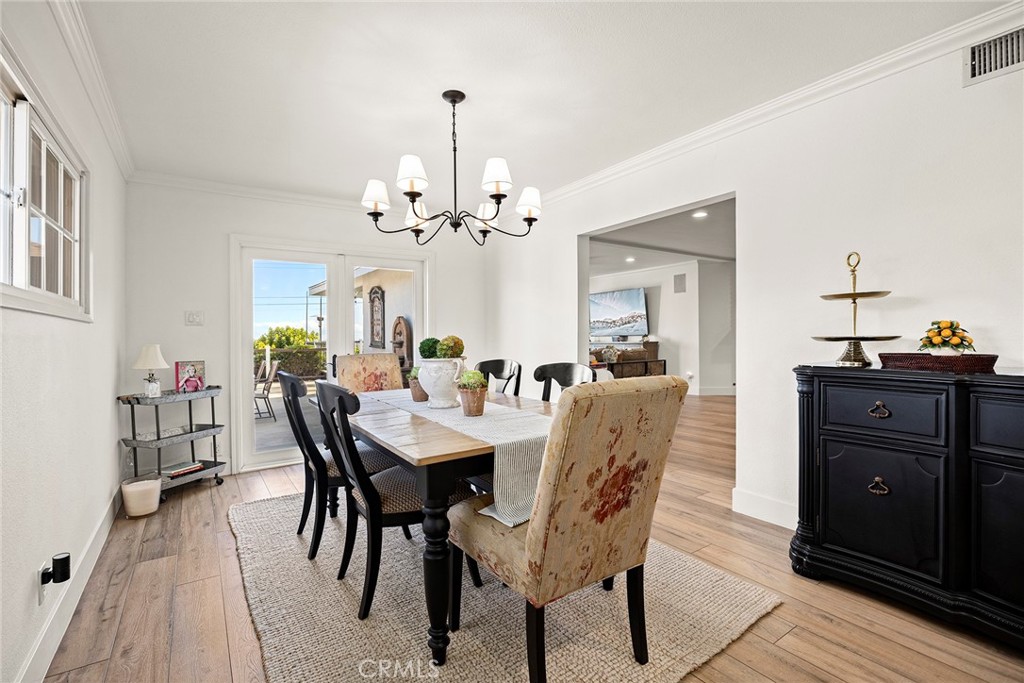 15914 West Road Whittier, CA 90603 - Photo 14 of 47 a view of a dining room with furniture and chandelier