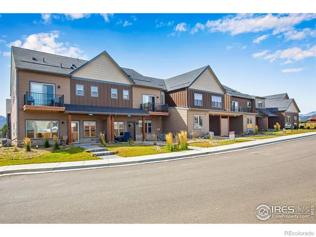 a front view of a house with a swimming pool