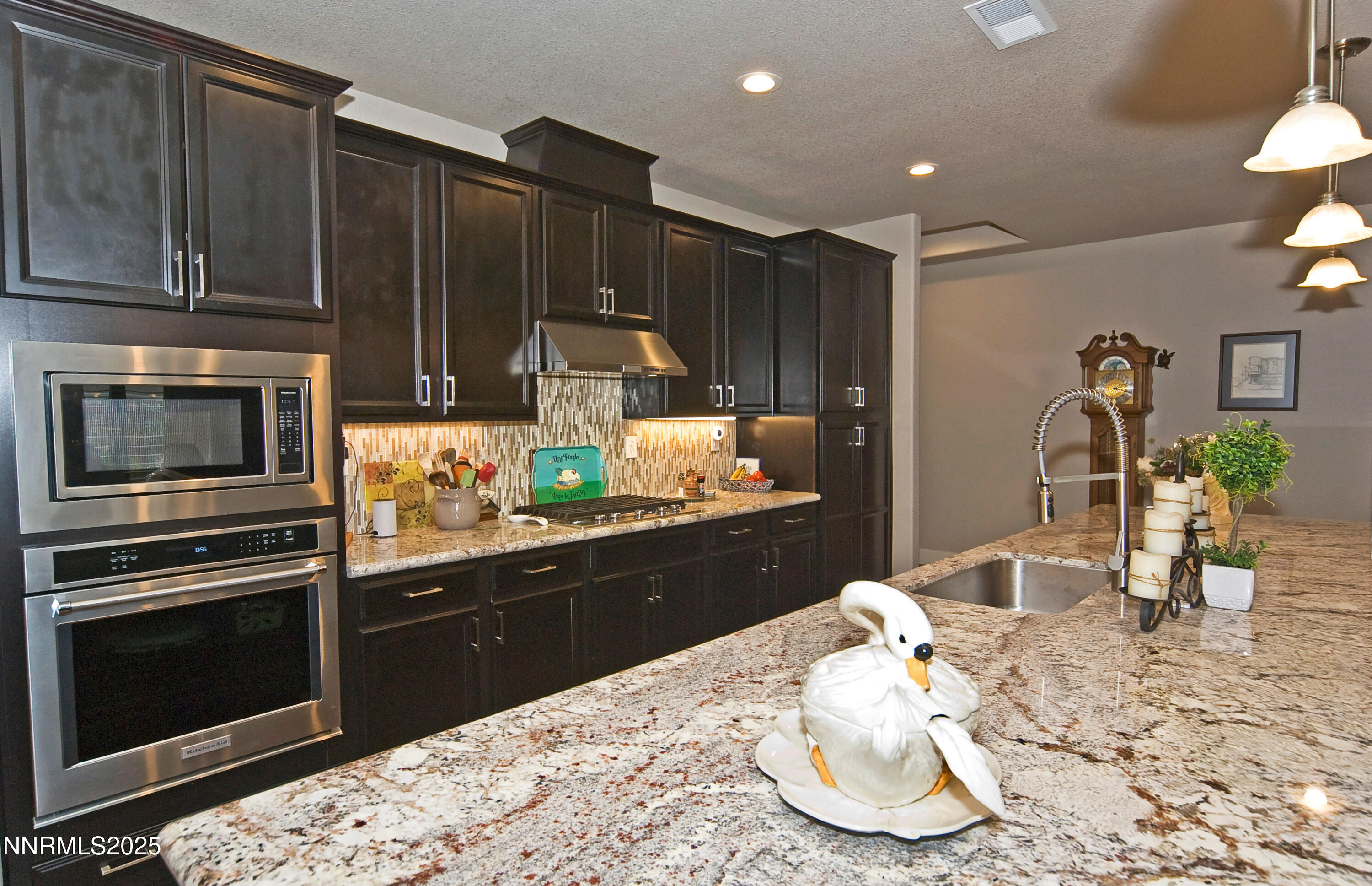 768 East Cottage Loop Gardnerville, NV 89460 - Photo 7 of 23 a kitchen with a sink and refrigerator