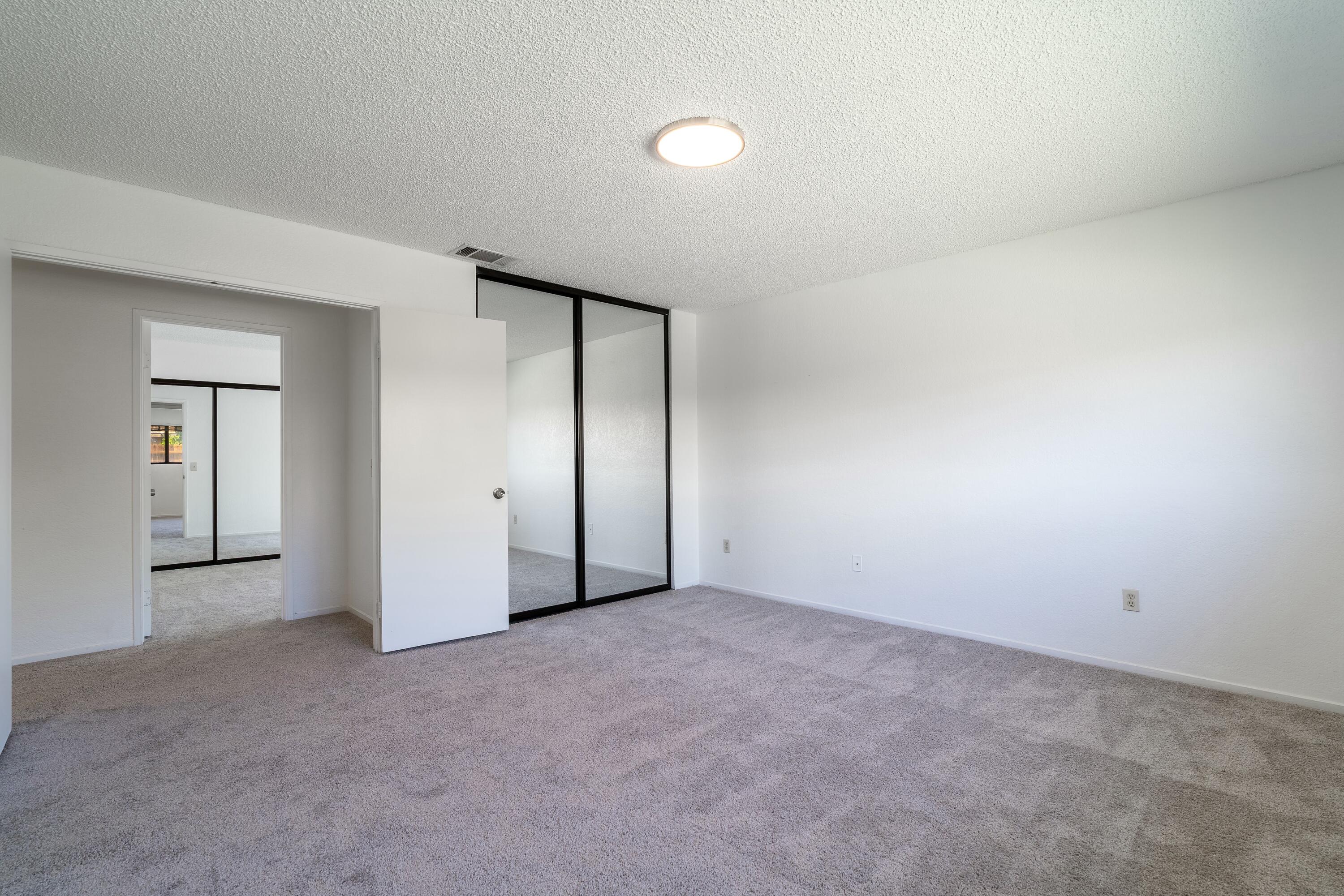 69290 El Dobe Road Cathedral City, CA 92234 - Photo 23 of 42 an empty room with closet area