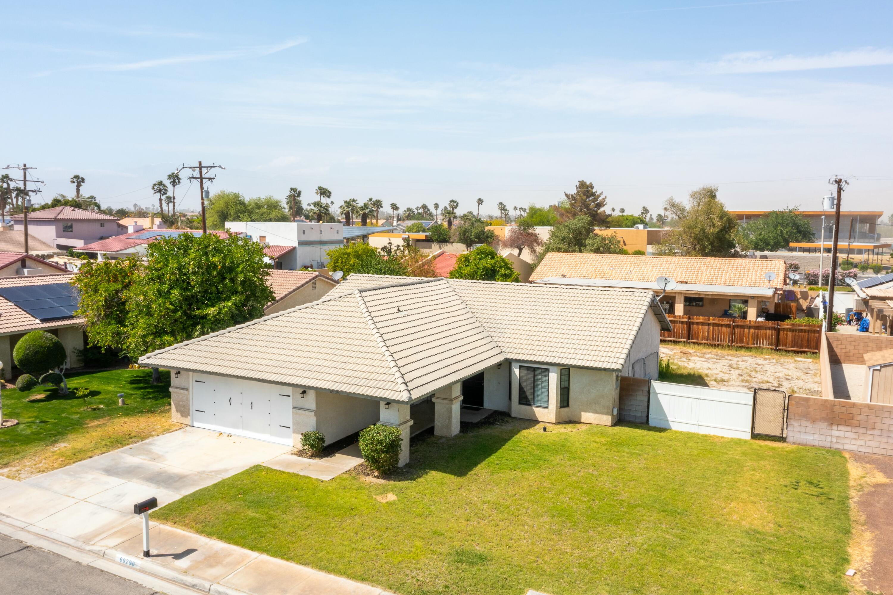 69290 El Dobe Road Cathedral City, CA 92234 - Photo 35 of 42 a view of a terrace with a lake view