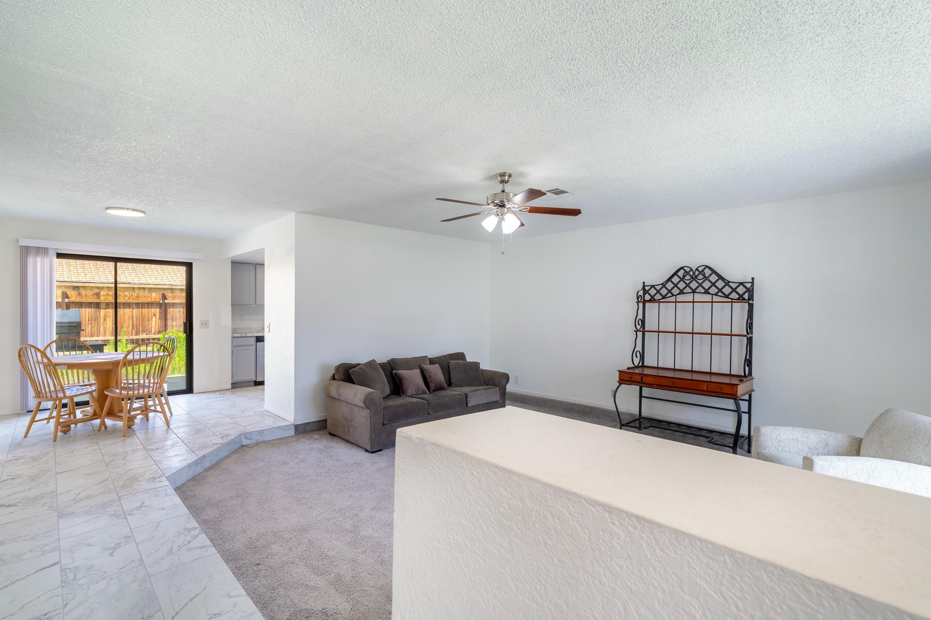 69290 El Dobe Road Cathedral City, CA 92234 - Photo 6 of 42 a bedroom with furniture and a window