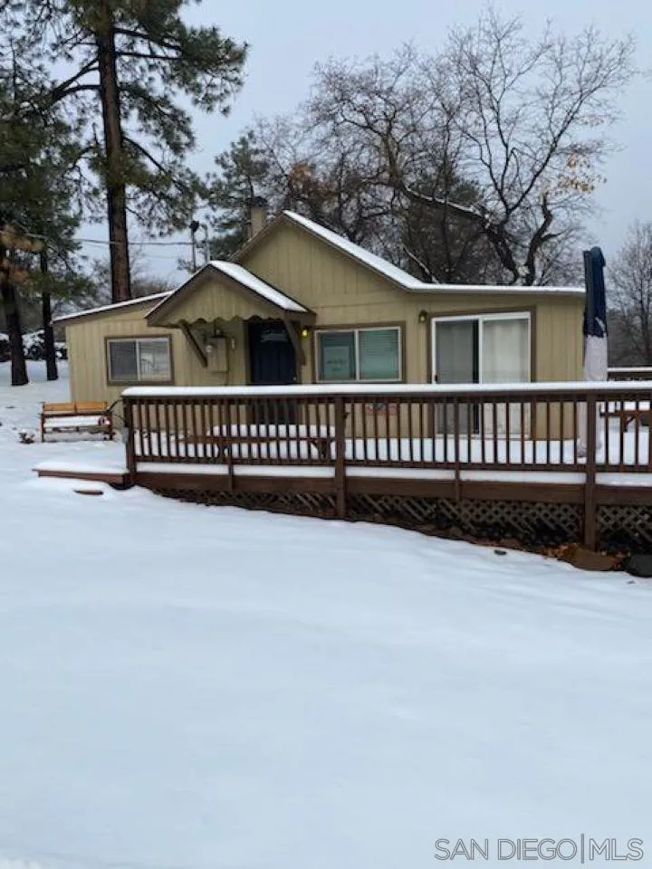 745 Boiling Springs Road Mount Laguna, CA 91948 - Photo 2 of 24 a view of a house with a wooden fence