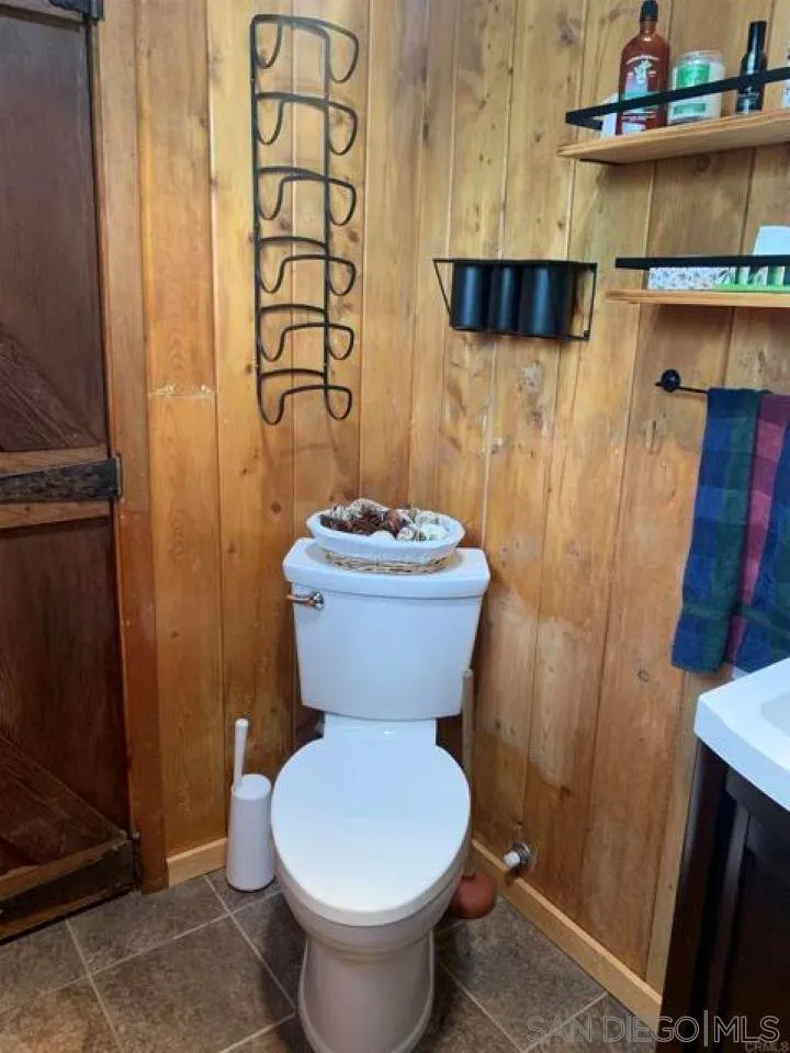 745 Boiling Springs Road Mount Laguna, CA 91948 - Photo 22 of 24 a white toilet sitting next to a small bathroom