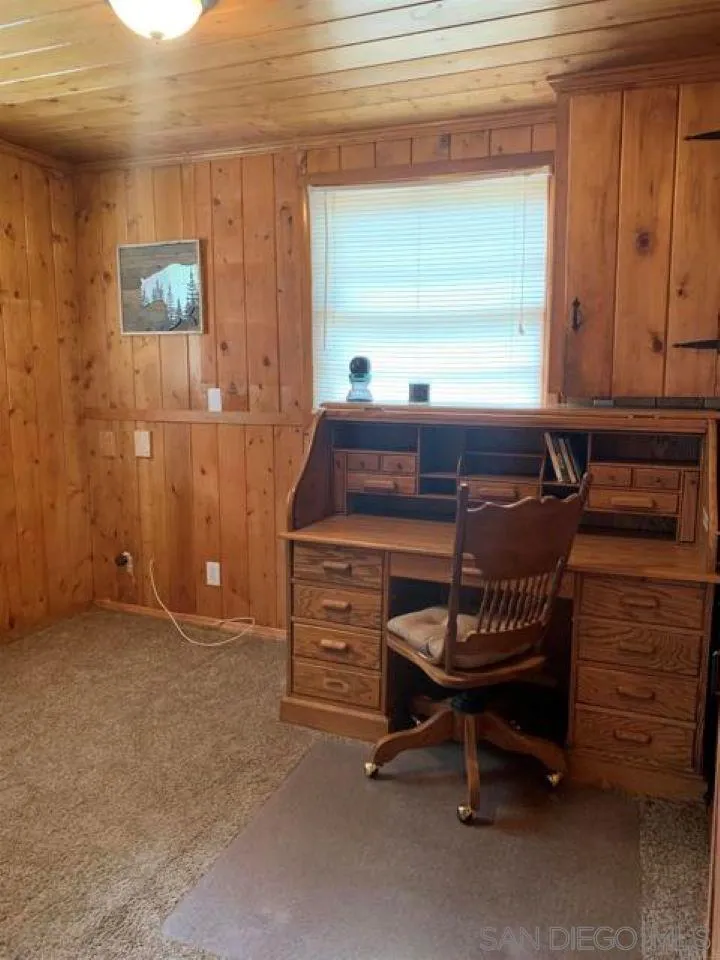 745 Boiling Springs Road Mount Laguna, CA 91948 - Photo 24 of 24 a room with a chair and a window