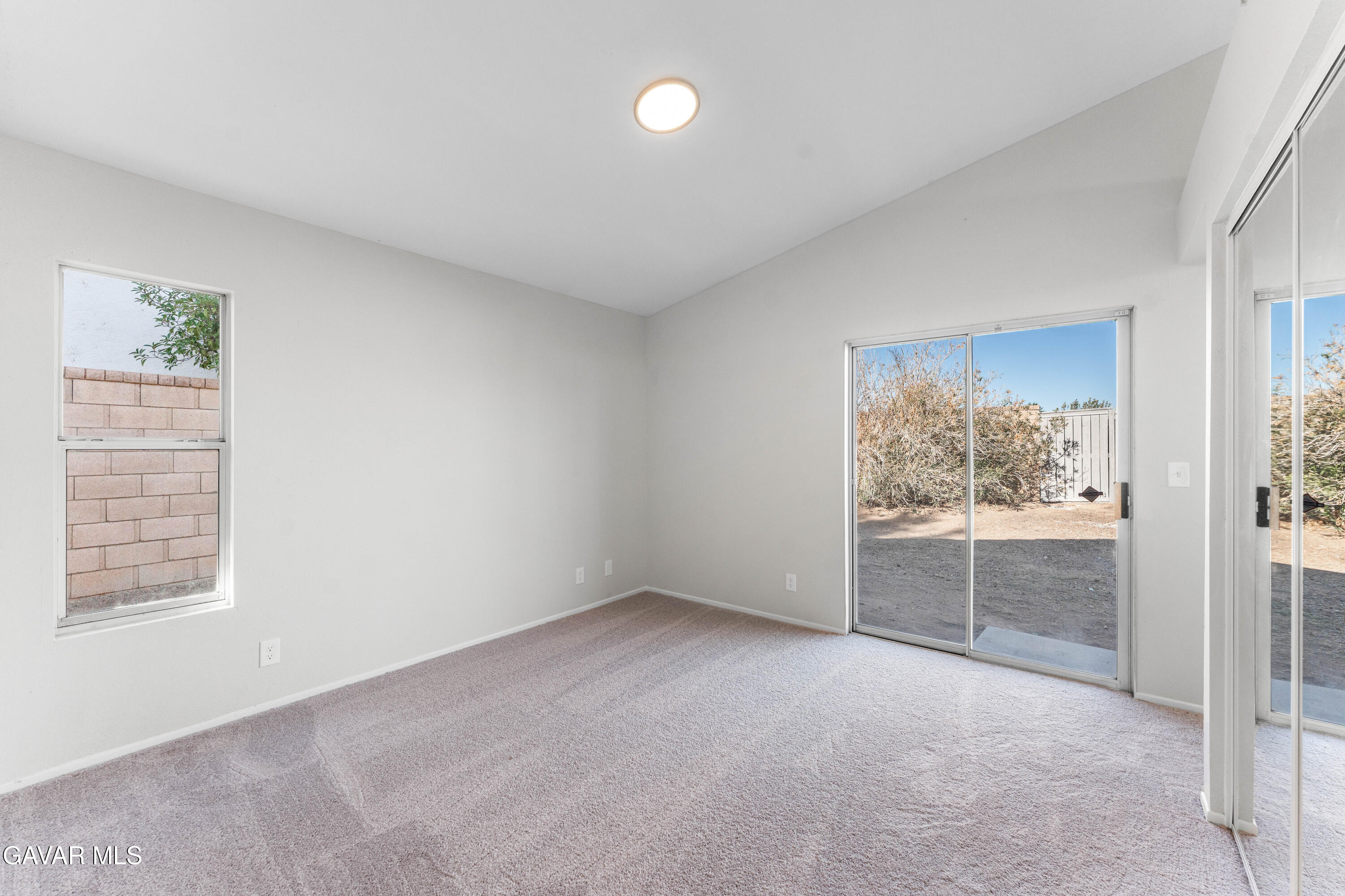 37031 Firethorn Street Palmdale, CA 93550 - Photo 24 of 36 a view of an empty room with a window