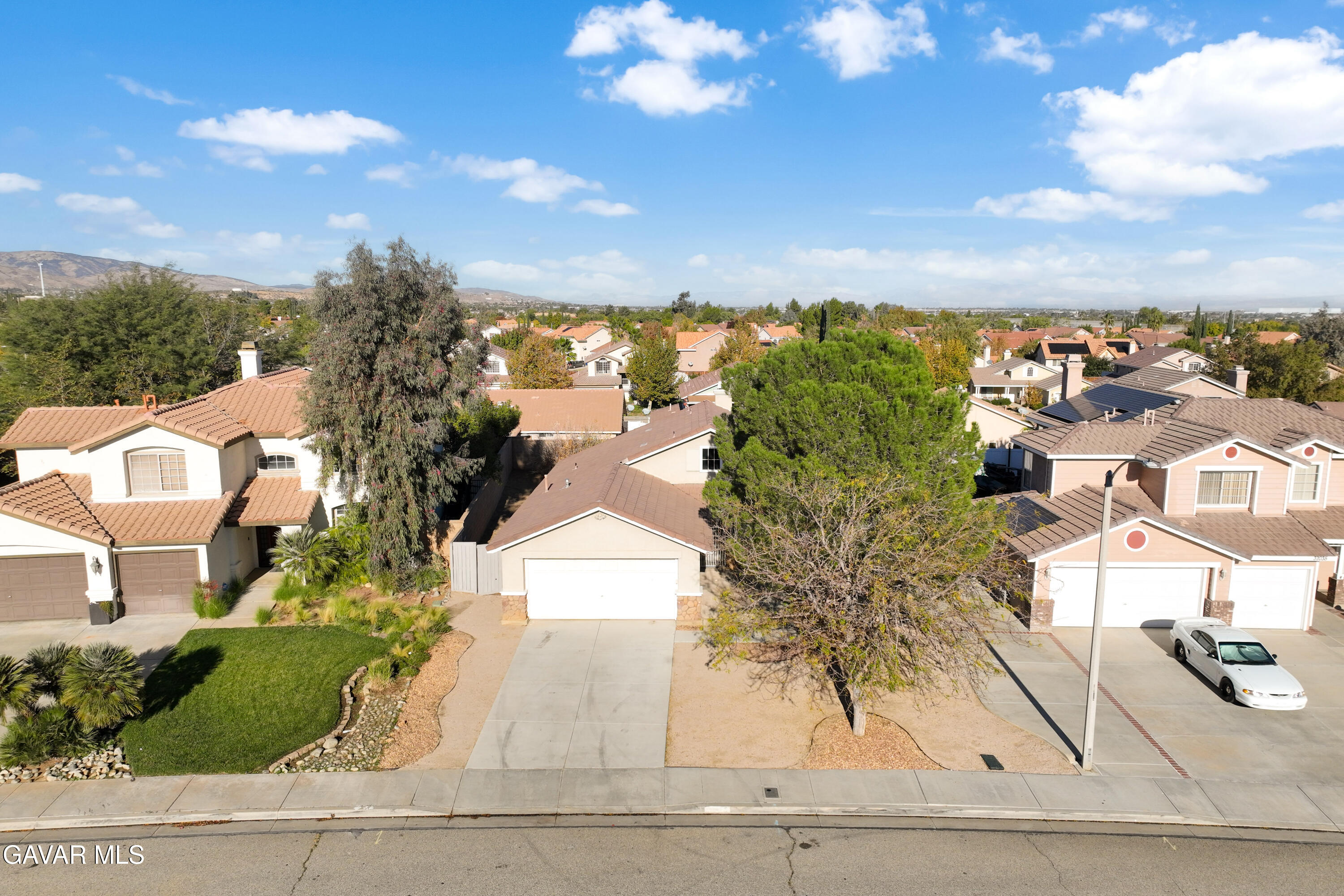 37031 Firethorn Street Palmdale, CA 93550 - Photo 33 of 36 an aerial view of multiple house