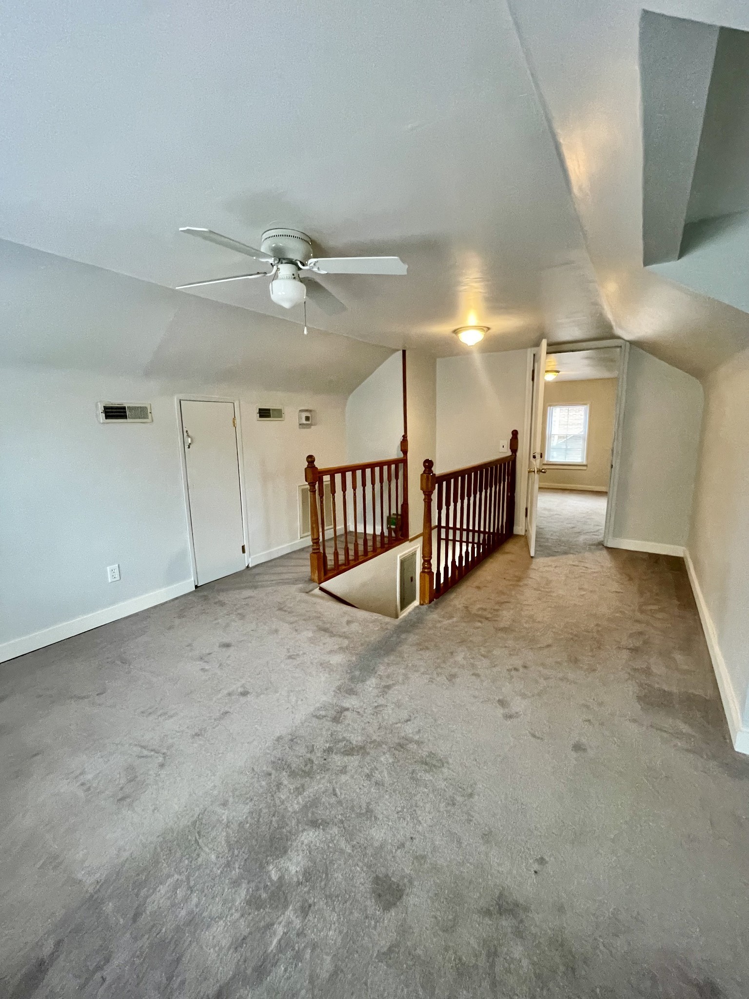 209 Frank Street Lawrenceburg, TN 38464 - Photo 30 of 34 a view of a livingroom with a staircase