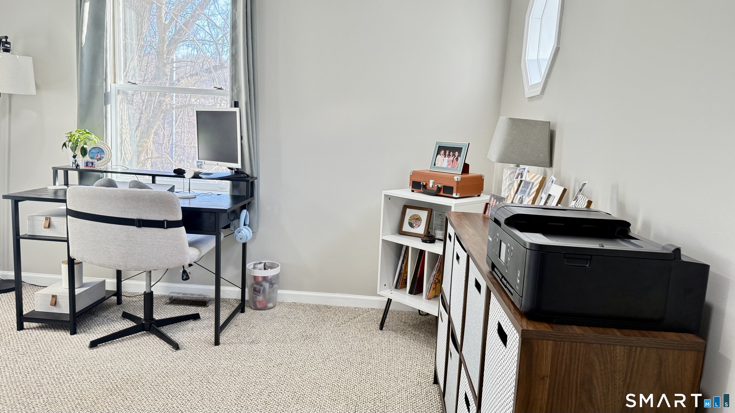 16 Maple Street, Unit 3 Vernon, CT 06066 - Photo 11 of 13 a living room with furniture and a mirror