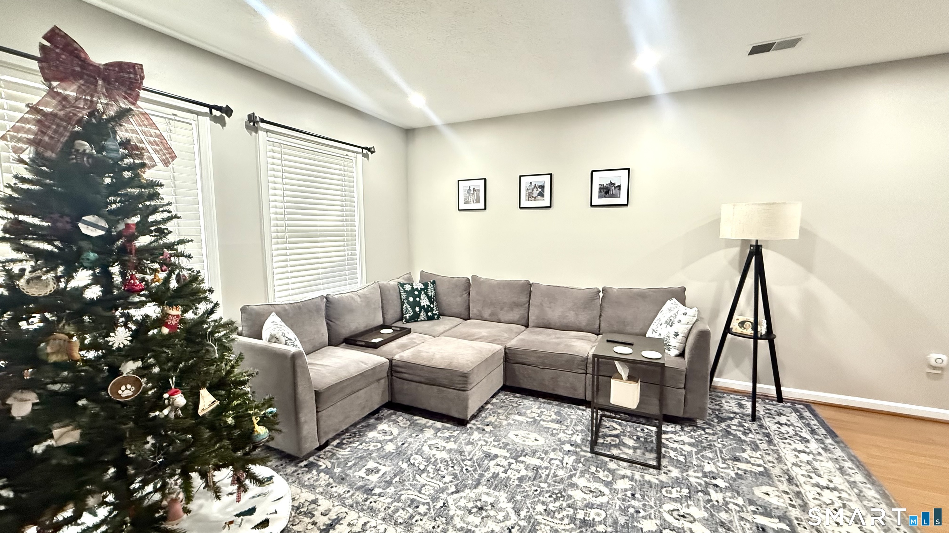 16 Maple Street, Unit 3 Vernon, CT 06066 - Photo 3 of 13 a living room with furniture and a window