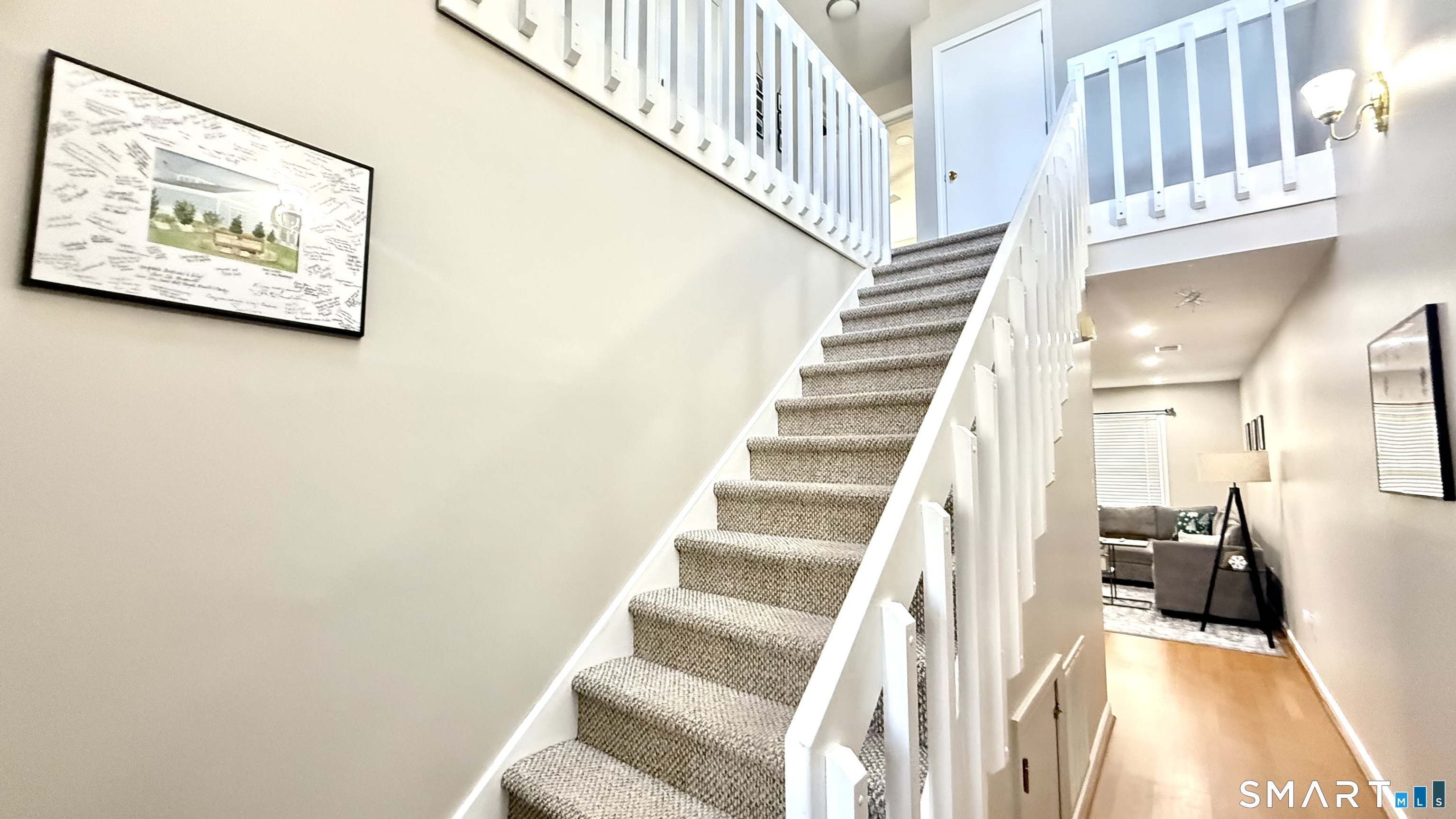 16 Maple Street, Unit 3 Vernon, CT 06066 - Photo 6 of 13 a view of entryway and hall with wooden floor
