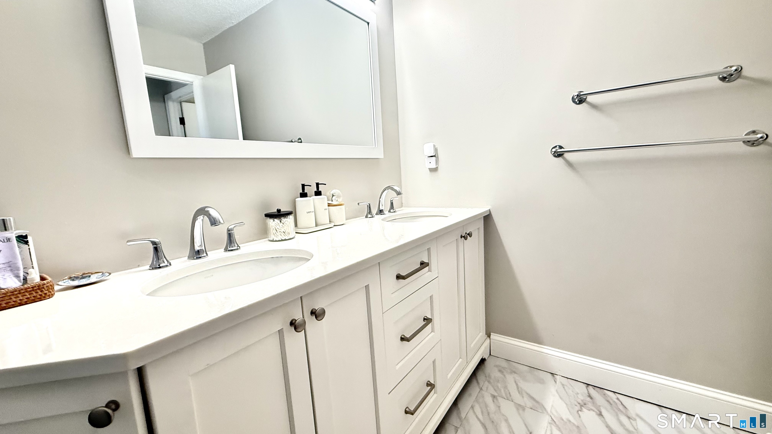16 Maple Street, Unit 3 Vernon, CT 06066 - Photo 8 of 13 a bathroom with a sink and a mirror