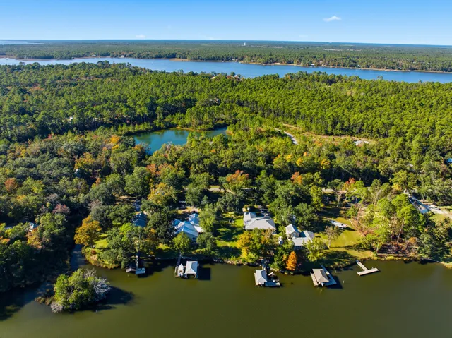 a view of a lake with a building in the background