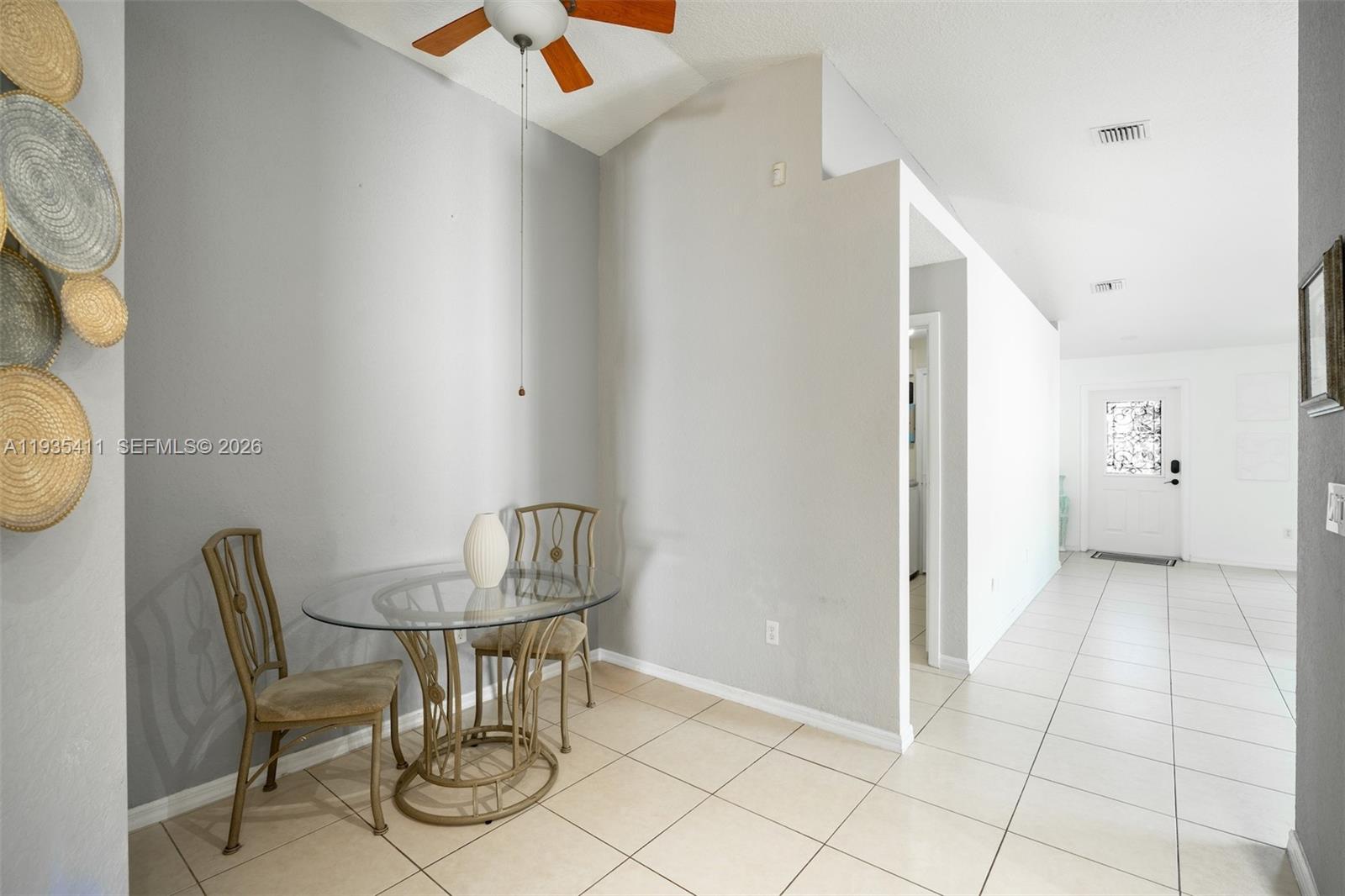 4521 Southwest 124th Terrace Miramar, FL 33027 - Photo 14 of 47 a view of a dining room with furniture