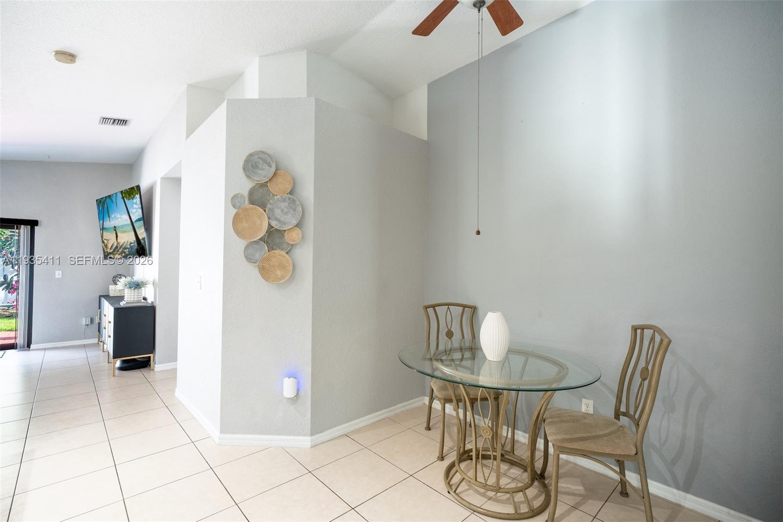 4521 Southwest 124th Terrace Miramar, FL 33027 - Photo 15 of 47 a view of a dining room with furniture