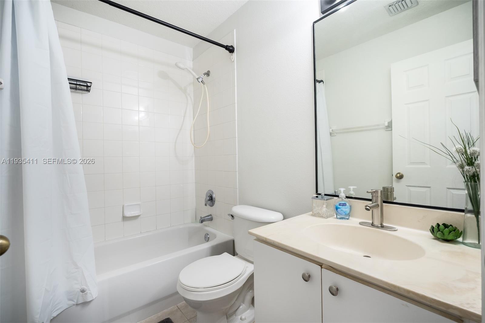 4521 Southwest 124th Terrace Miramar, FL 33027 - Photo 26 of 47 a bathroom with a sink toilet and shower