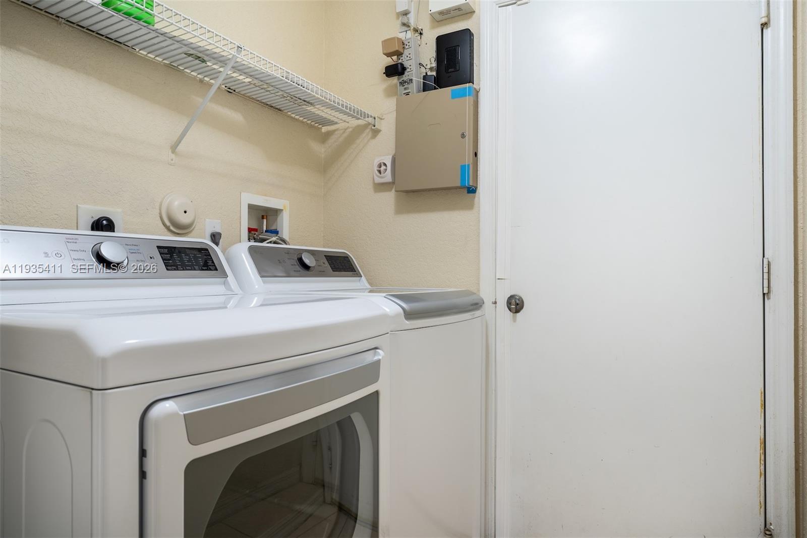 4521 Southwest 124th Terrace Miramar, FL 33027 - Photo 28 of 47 a close view of washer and dryer