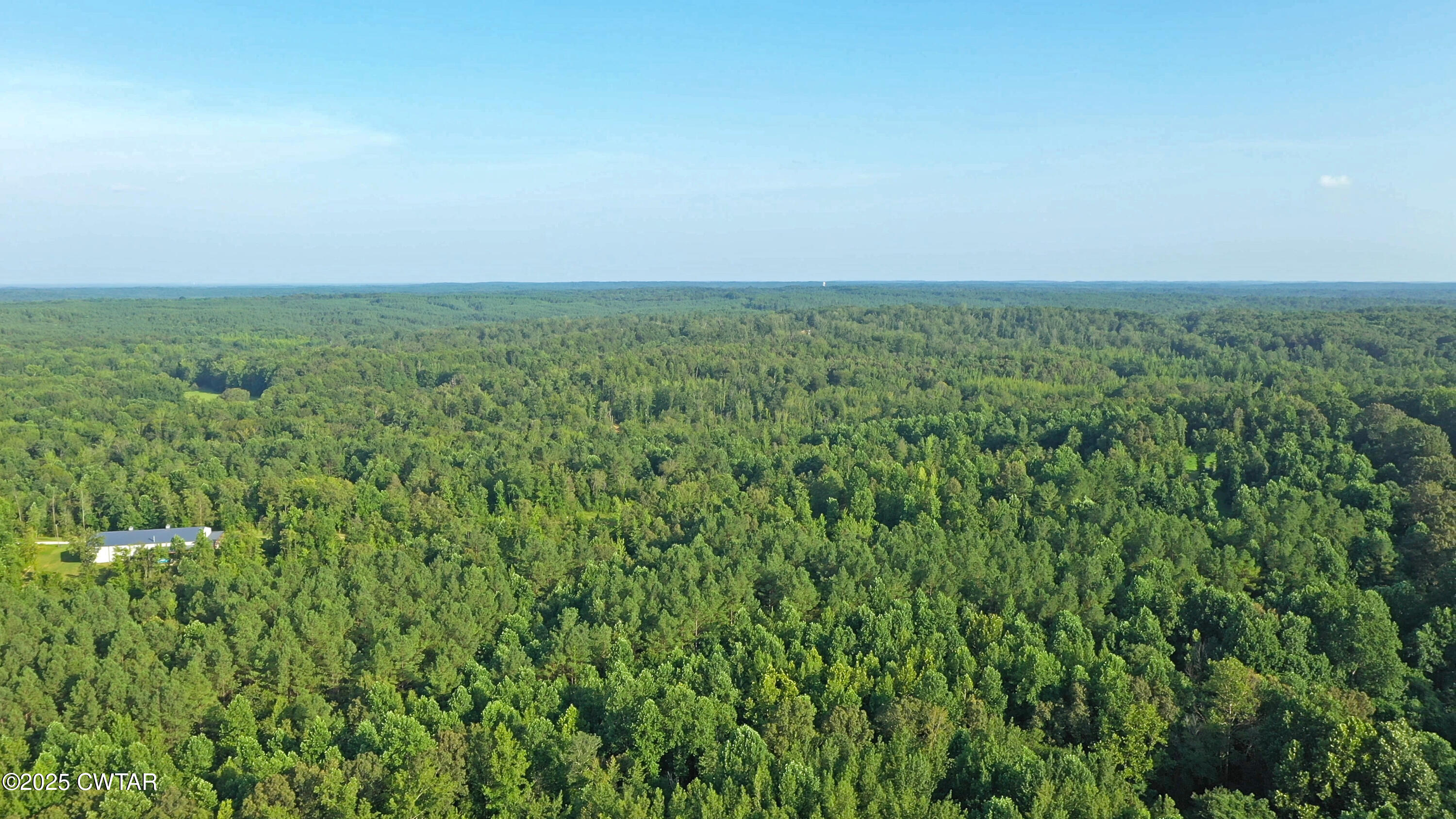0 Willoughby Loop Pinson, TN 38366 - Photo 7 of 14 a view of a field with an ocean