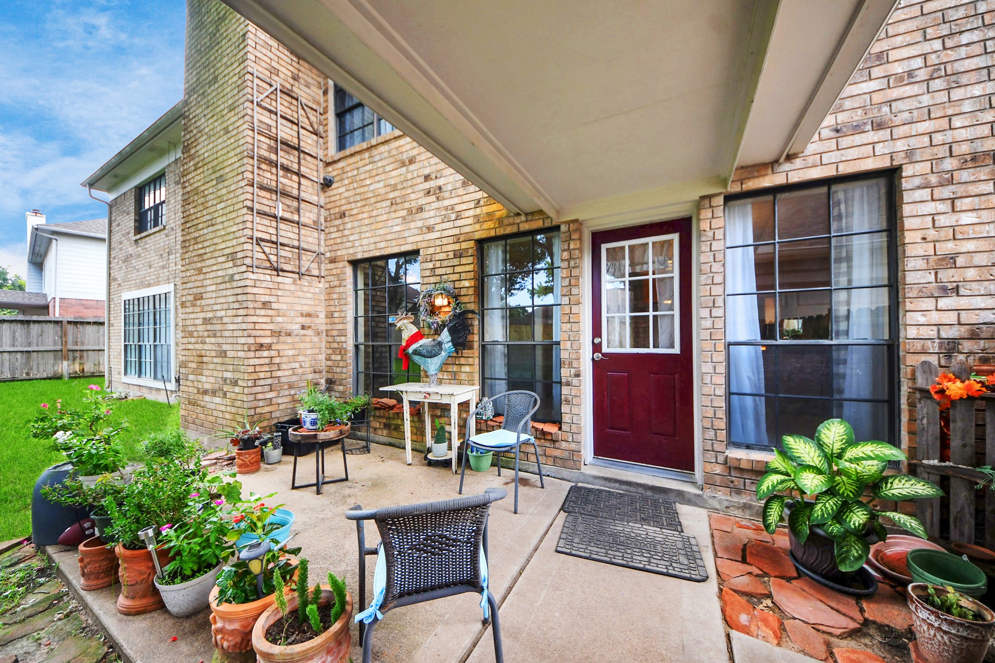 3107 Dulaney Road Houston, TX 77084 - Photo 44 of 50 a view of a chairs and table in a patio