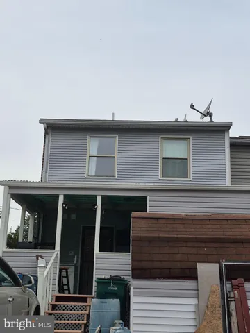 a view of swimming pool with outdoor seating