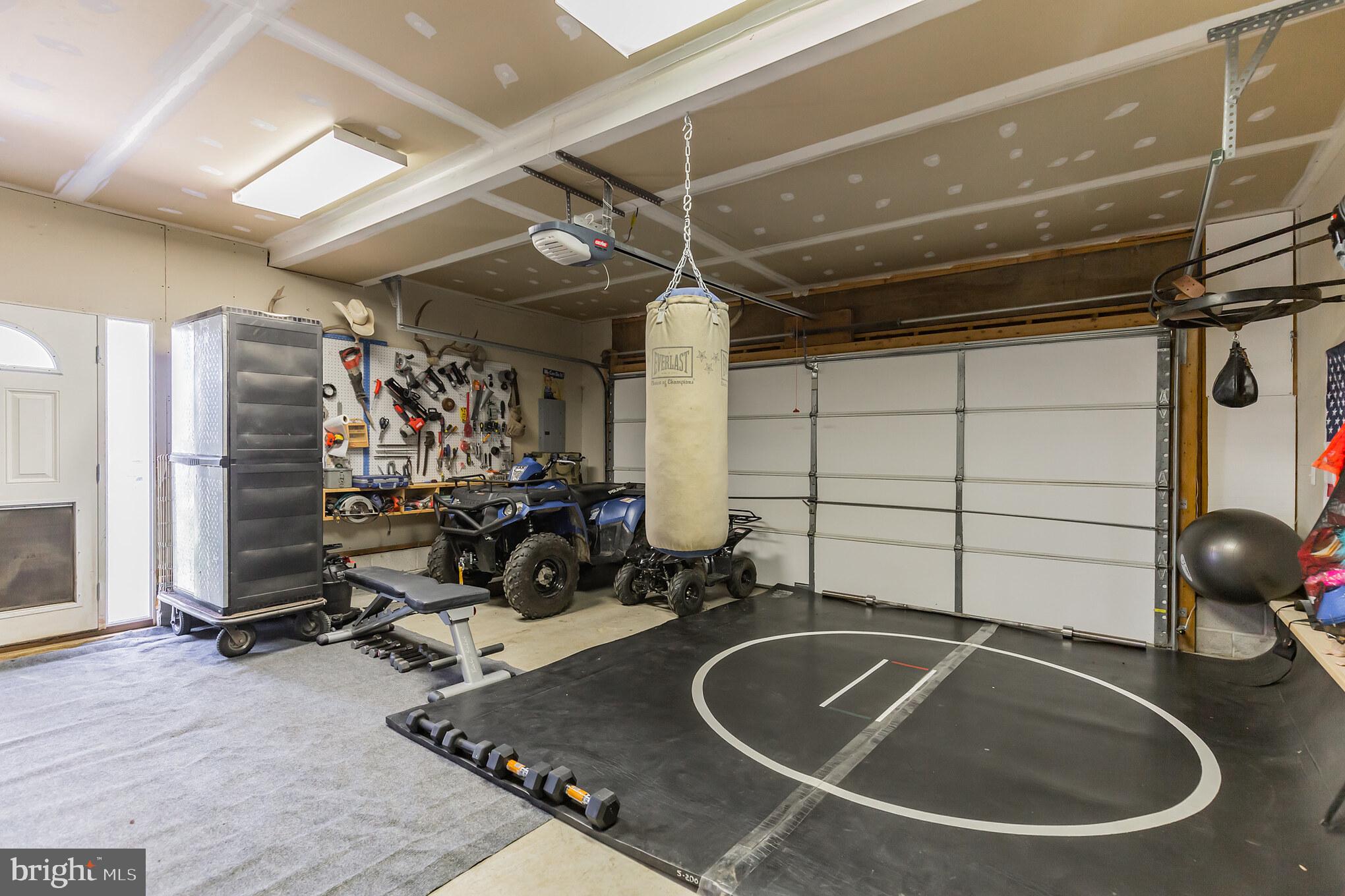 8130 Bourne Road Owings, MD 20736 - Photo 41 of 41 Garage Turned Workout Space