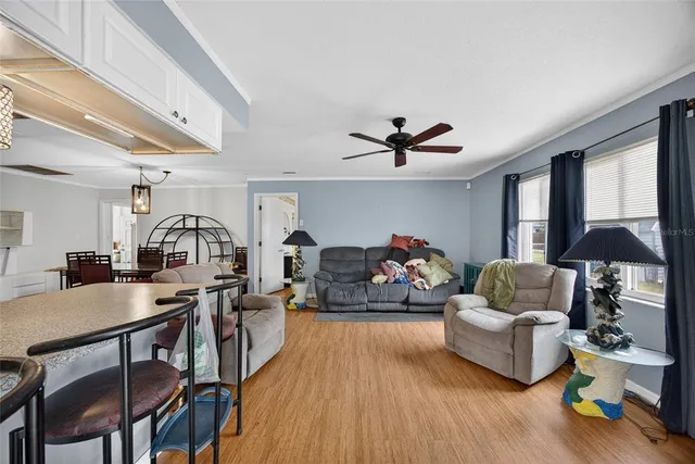 a living room with furniture and a window