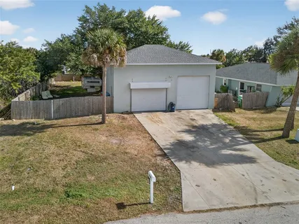 a house view with a outdoor space